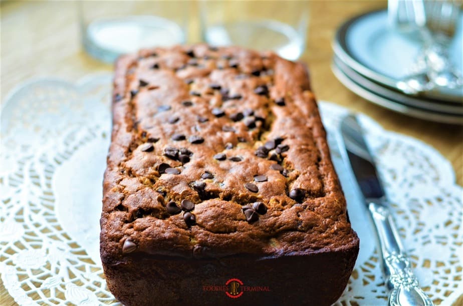 Baked banana bread on a board.