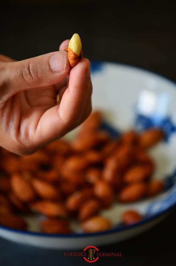 Soaked and half pealed almond.