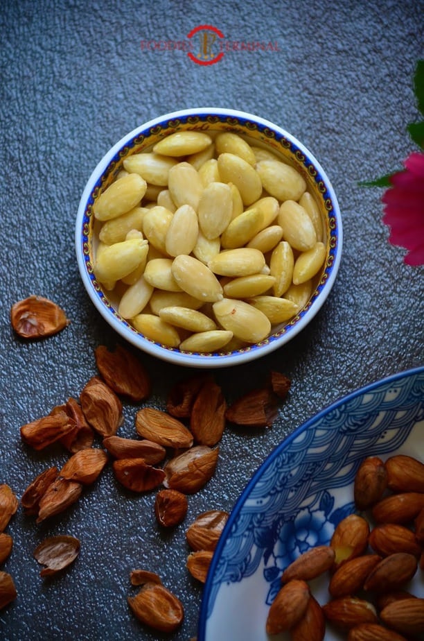 Soaked and pealed almonds in a dish.