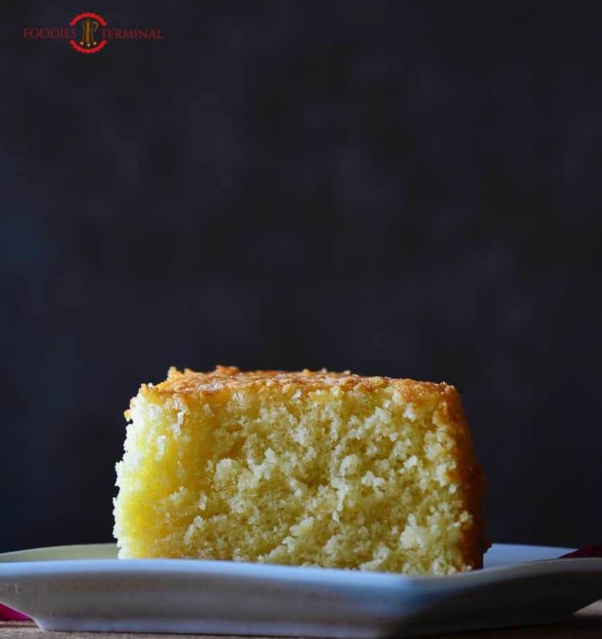 A piece of hot milk cake served on a dish.