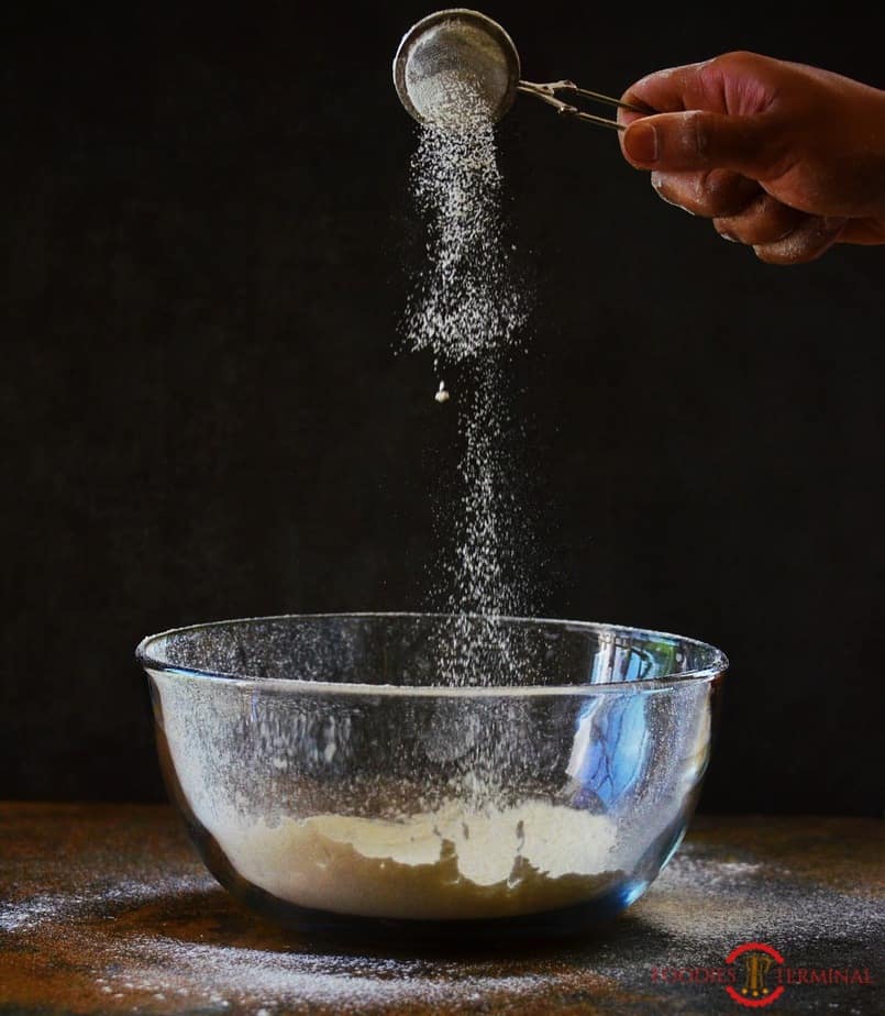 Flour in a glass bowl.