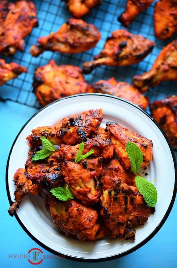 Tandoori chicken served on a dish.