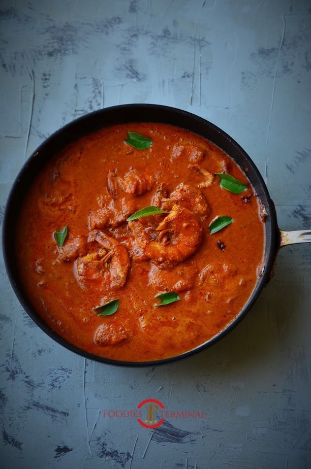 Goan Prawn Curry in the pan with curry leaves.