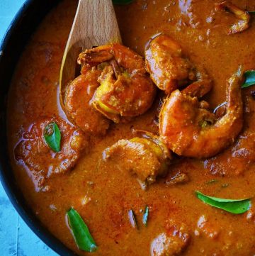 Goan Prawn curry decorated with curry leaves