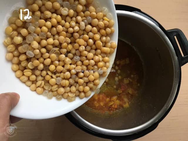 Added the boiled yellow peas to the instant pot along with some water.