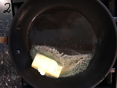 Butter molten on heated pan.