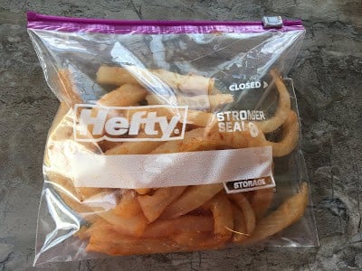Fish fingers in a zip lock bag ready to be frozen