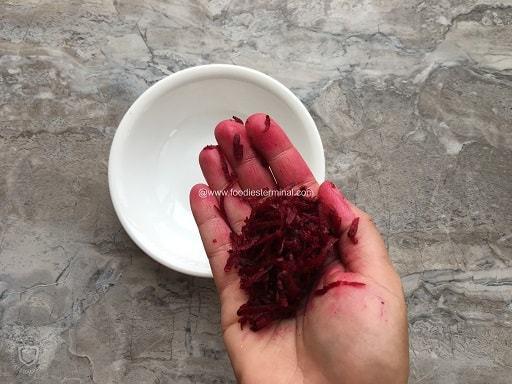 Grated beet ready to be juiced.
