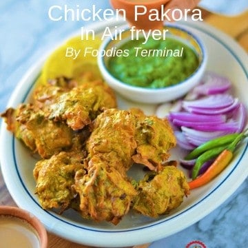 Chicken Pakora air fryer served in an oval plate