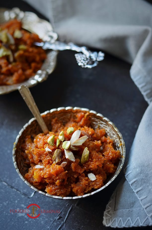 Pressure Cooker Carrot Halwa served served with chopped nuts