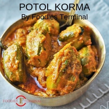 Potol Korma served in a small brass bowl