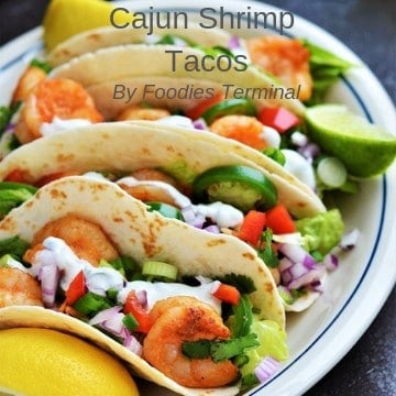 Four Cajun Shrimp tacos served