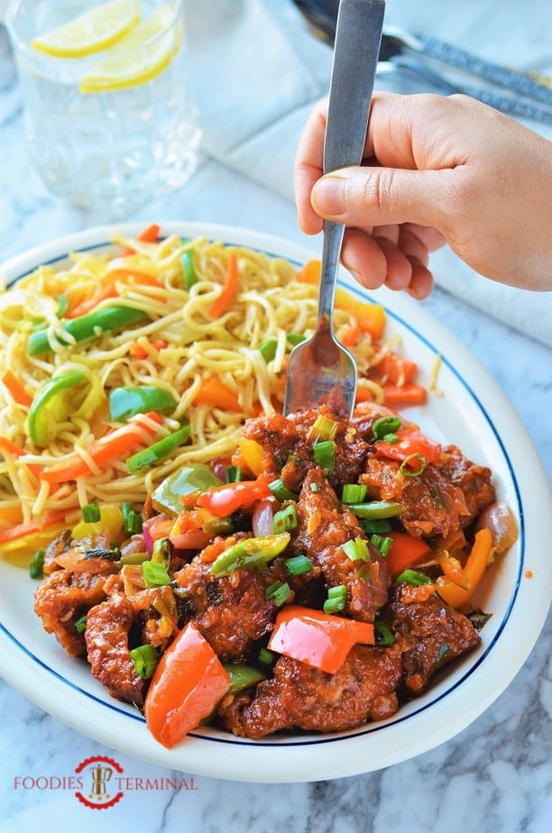 Chilli Chicken recipe air fryer served with hakka noodles