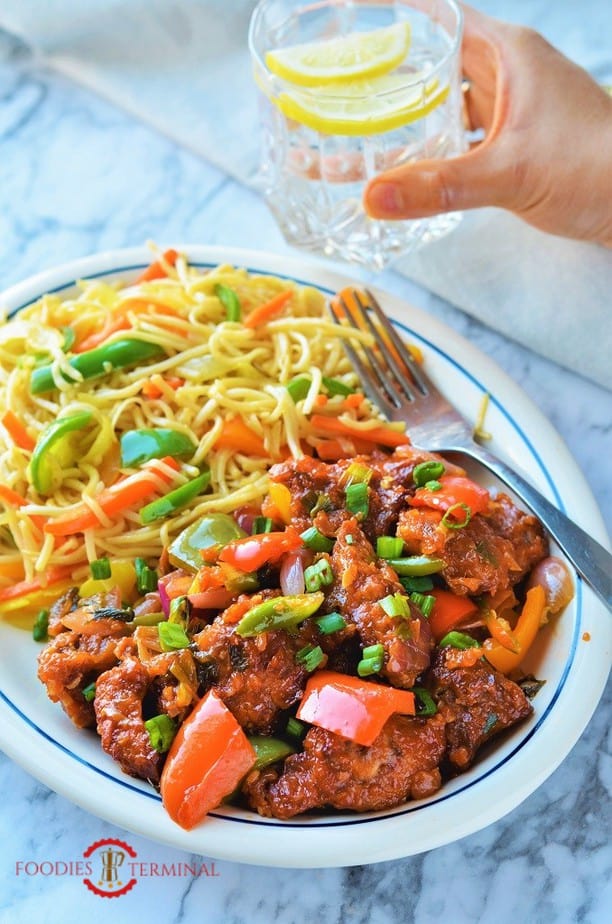 Air fryer Indo Chinese Chilli chicken served with noodles