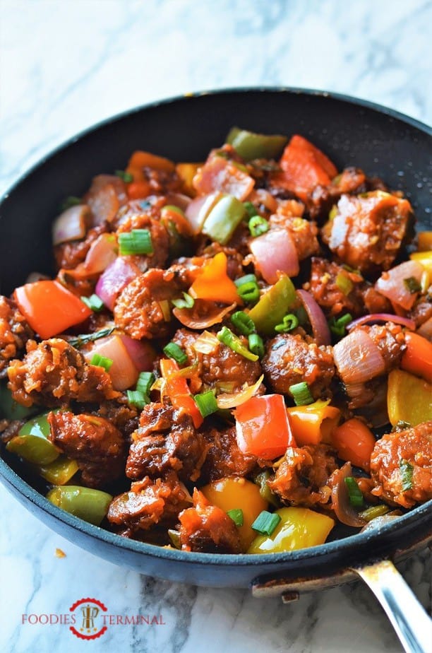 Air fryer chilli chicken dry in a skillet