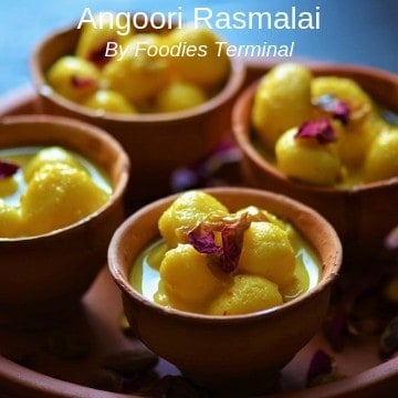 Angoori Rasmalai Recipe served in clay pots