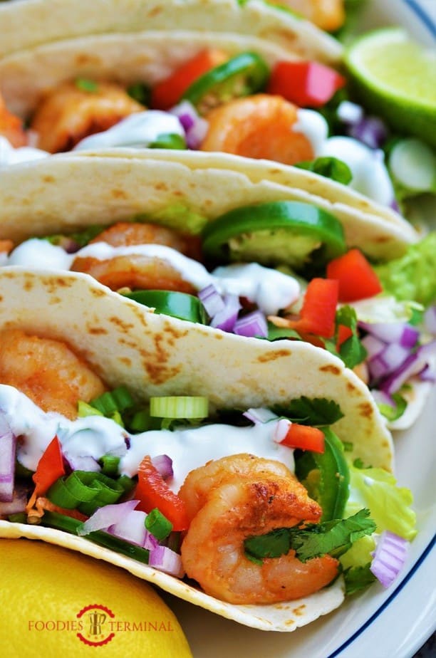 Cajun Shrimp tacos filled with colorful veggies