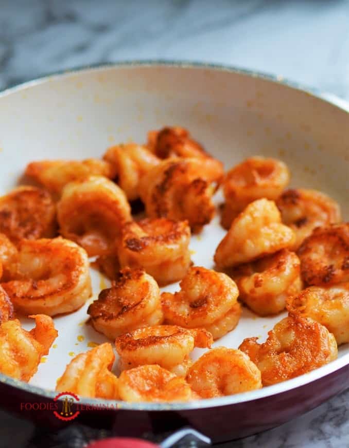 Cajun Shrimps on a white skillet