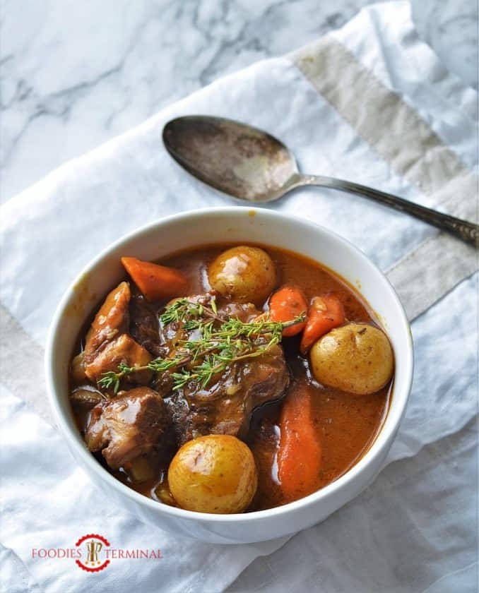 Lamb stew cooked with root vegetable in instant pot