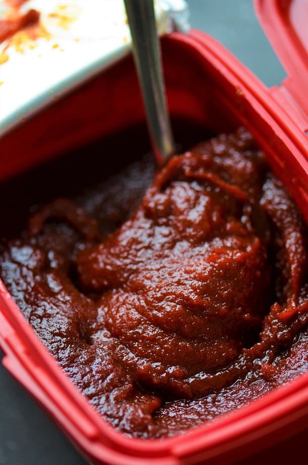 Gochujang Sauce in a red tub