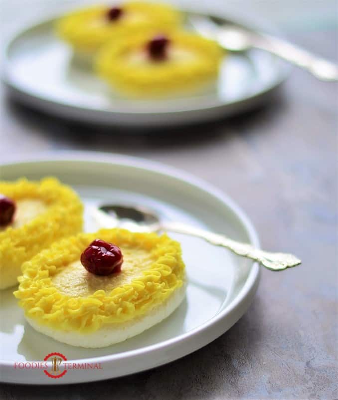 Malai Chop or Cream Chop sweets served on a white plate