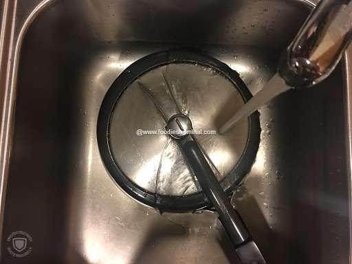 Cooling the hot pressure cooker under tap water
