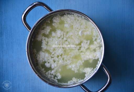 Curdled milk in a steel pot