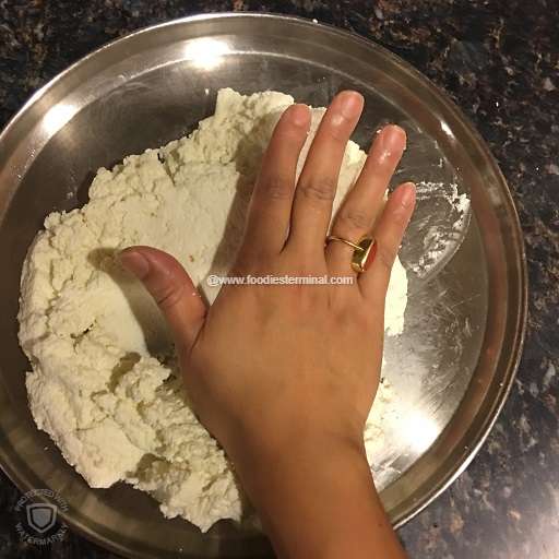 Kneading the cottage cheese or chena