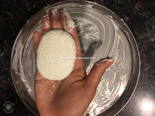 Shaping flat discs from cottage cheese or chena balls