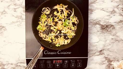 Frying leeks & garlic on a skillet