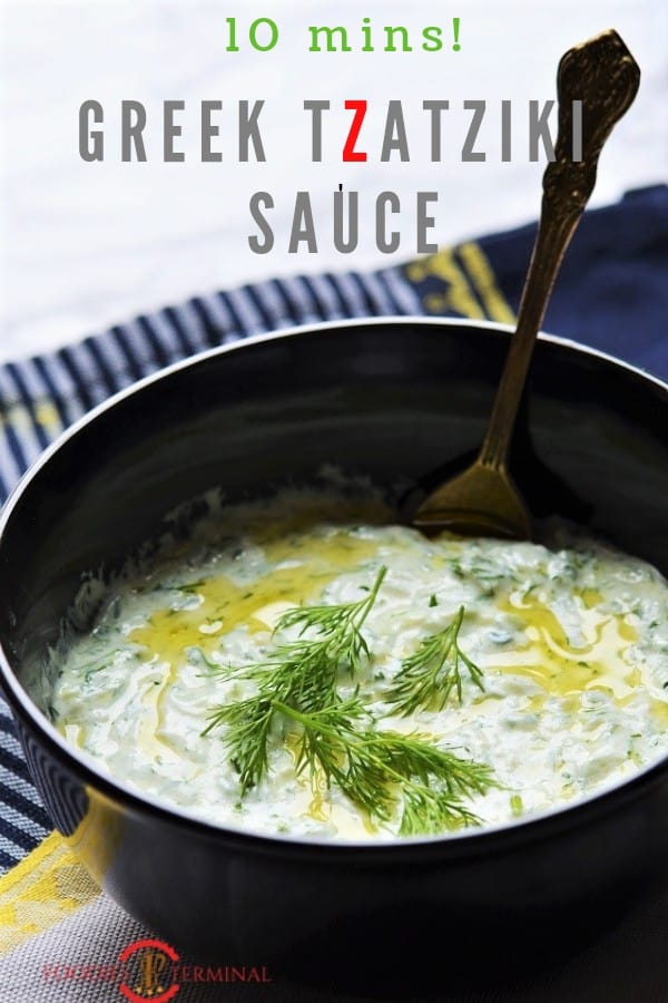 Tzatziki Sauce recipe in a black bowl with a spoon