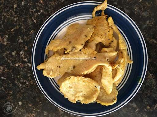 Pan seared chicken breasts on a smal plate