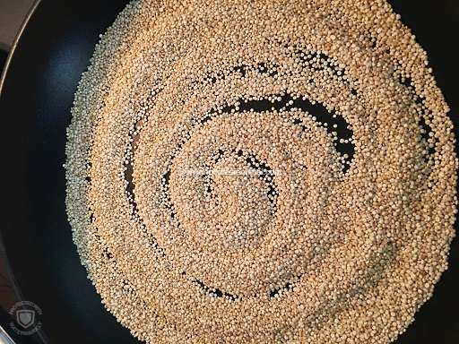 Pan roasting raw quinoa