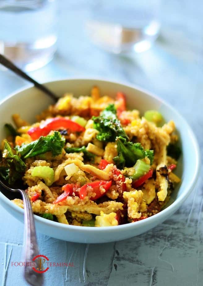 Warm quinoa salad with colorful vegetables