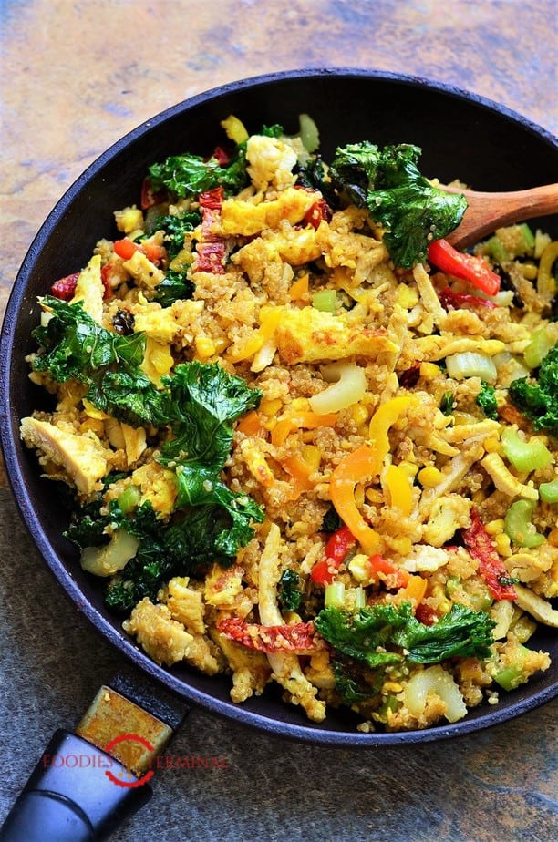 Warm quinoa salad in a black skillet