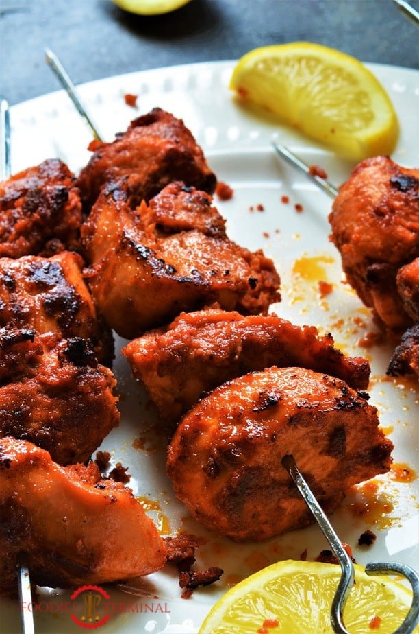 Delicious Juicy chicken boti kabab on metal skewers