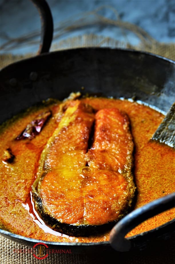 Doi Maach recipe served in an iron Kadhai