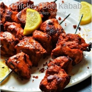 Chicken Boti Kabab served with lemon wedges