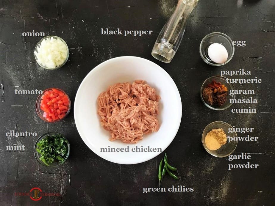 Recipe ingredients kept in bowls on a black surface