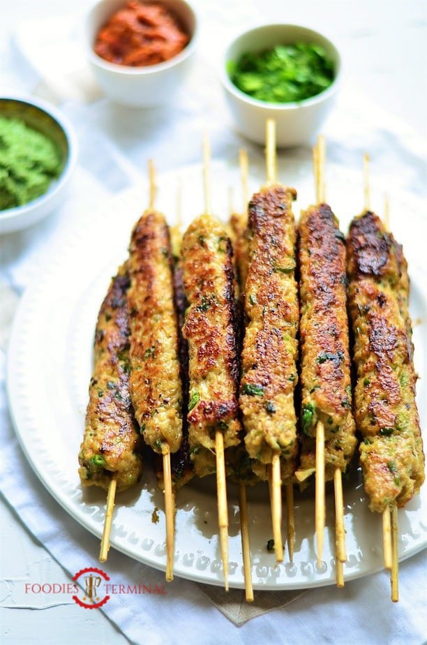 chicken keema kabab stacked on a plate