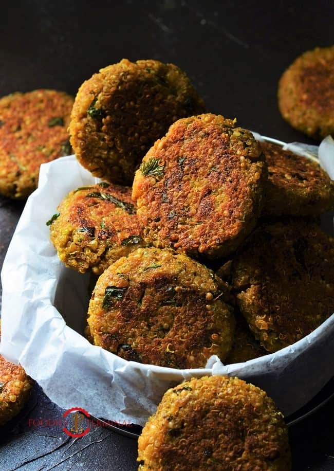 Quinoa Patties kept in a small box layered with parchment