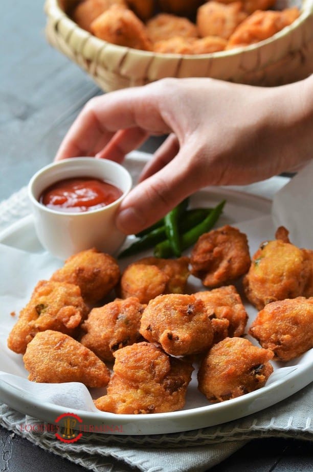 Masoor dal pakoda on butter paper & on a plate