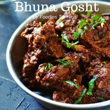 Bhuna Gosht cooked with Goat meat garnished with cilantro