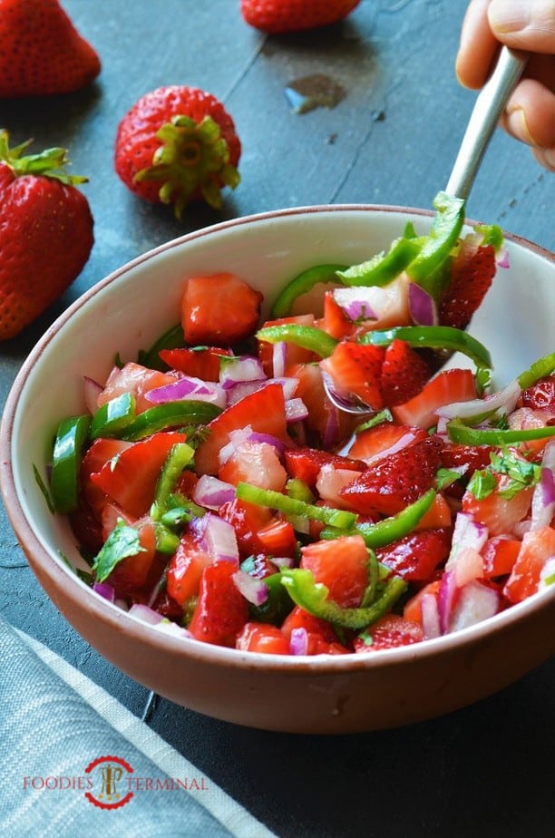 Strawberry Jalapeno Salsa in a terracotta rimmed bowl