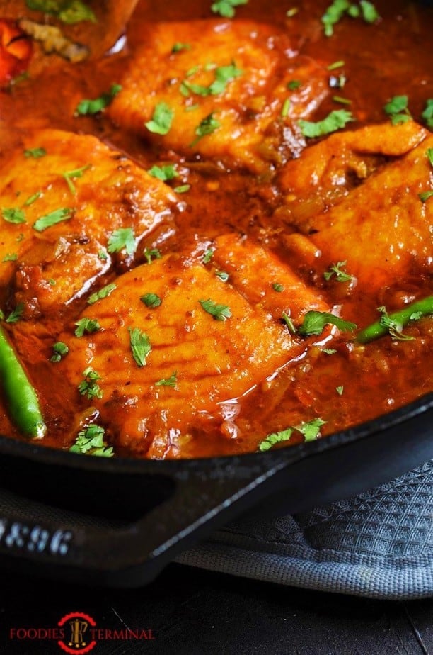 Indian Salmon curry cooked with Salmon fillet in a red sauce