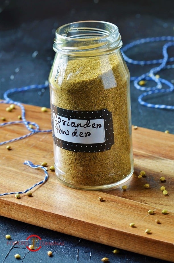 Homemade coriander powder in a glass jar