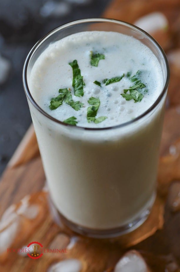 Frothy Masala Chaas garnished with cilantro