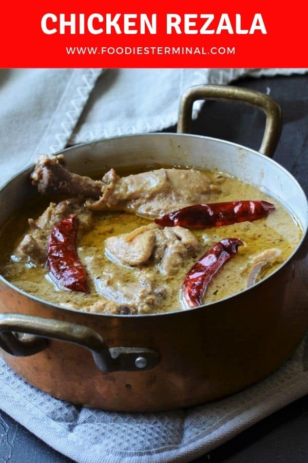 Chicken Rezala cooked in Bengali style in white curry with posto doi