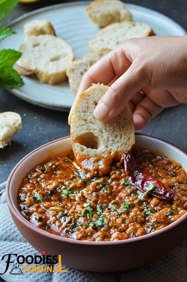 Tawa Chicken keema hyderabadi style scooped with baguette