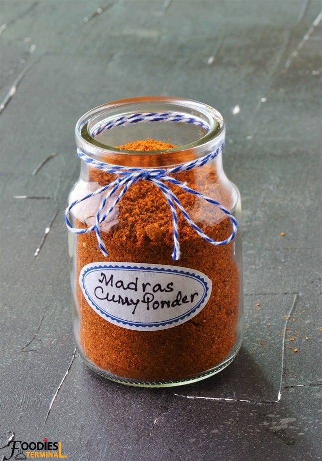 Madras Curry Powder Recipe Tamil in tiny jar with string